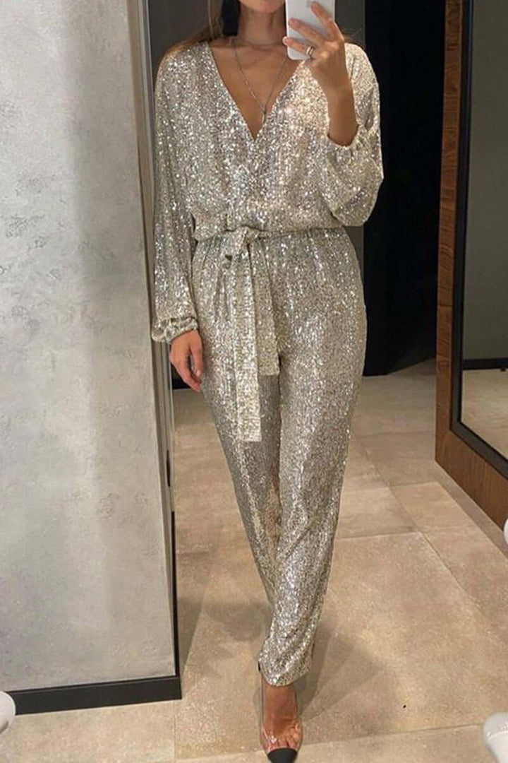 Shimmering sequin bandage jumpsuit for women with a V-neck, a glamorous choice for parties & events.