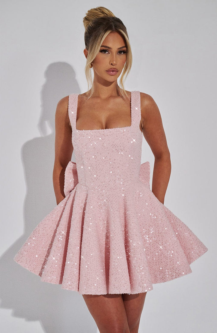 Glamorous women's sequin prom mini dress featuring a square neck, A-line cut, and elegant back bow.