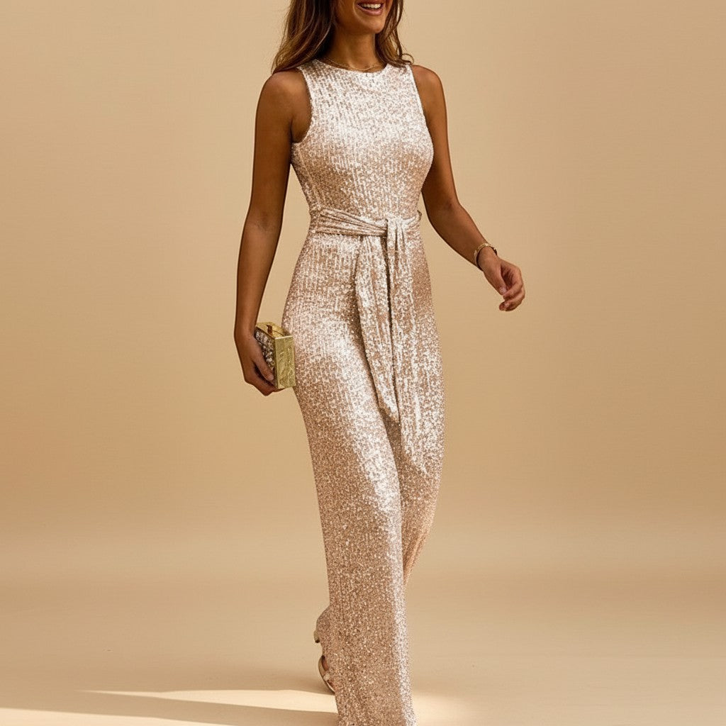 Sparkling sequin wide-leg jumpsuit for women. Features a flattering waist tie, ideal for special occasions.