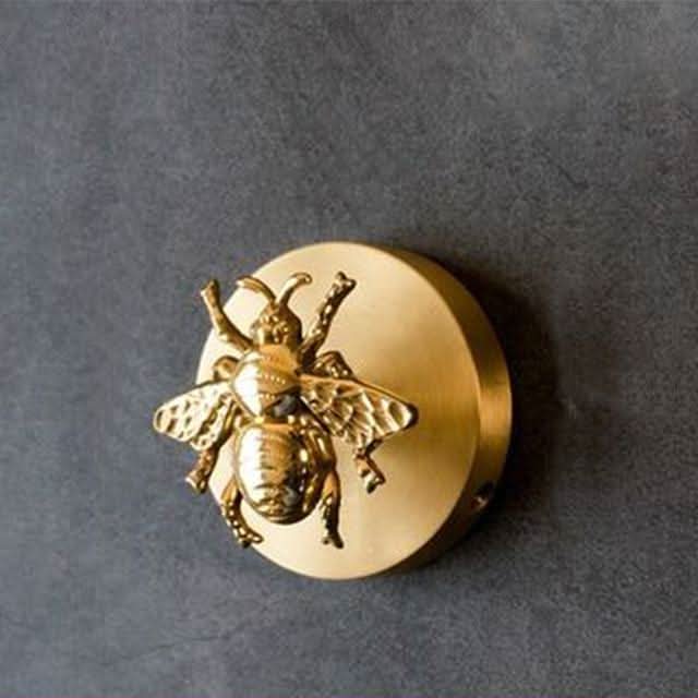 Gold brass animal wall hook. A chic bathroom accessory or entryway coat hook, blending decor & function.