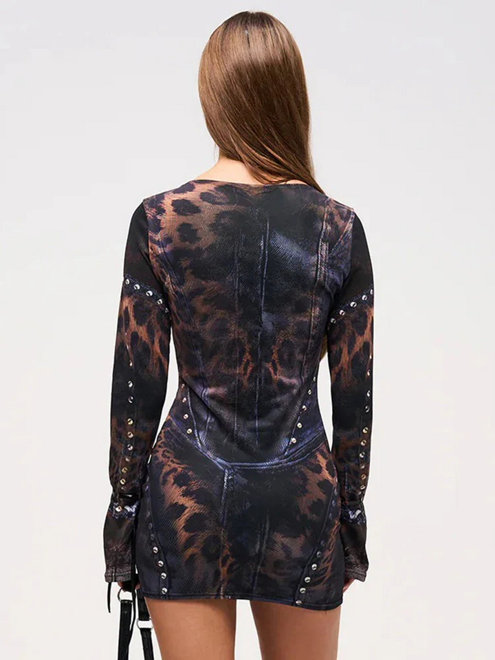Women's statement mini dress featuring a gothic leopard gradient pattern.