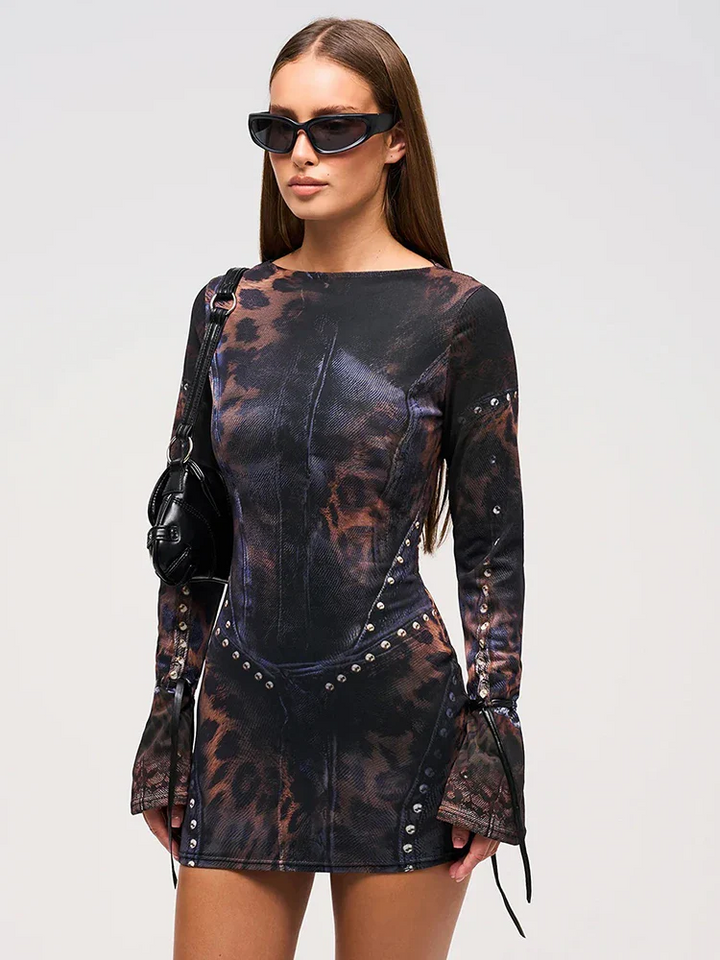 Edgy long sleeve mini dress with a bold leopard print, perfect for parties.