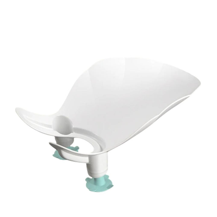 Close-up of a comfortable baby bath seat in green, highlighting its safe design for newborns.
