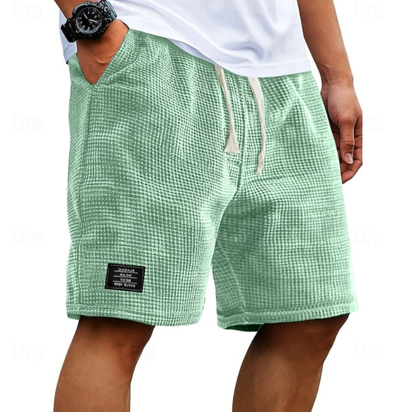 Men's relaxed fit summer shorts, crafted from breathable, lightweight fabric for ultimate casual comfort.