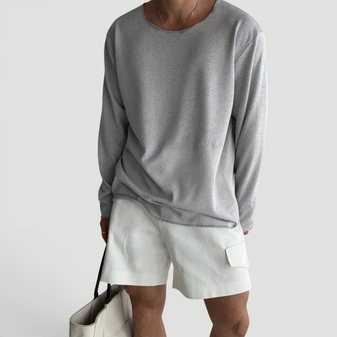 White men's classic long sleeve shirt, relaxed fit, breathable fabric for all-season comfort.