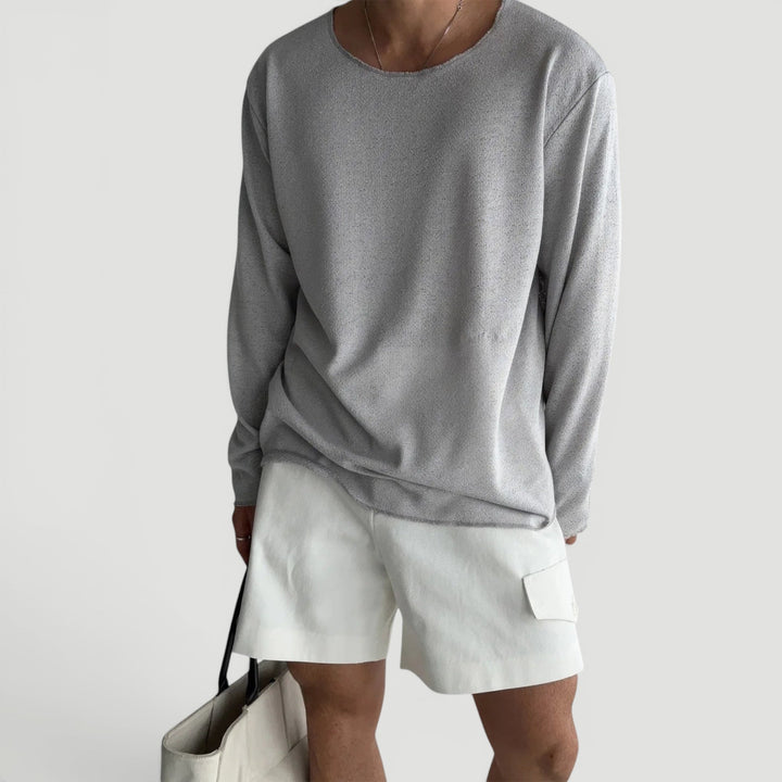 White men's classic long sleeve shirt, relaxed fit, breathable fabric for all-season comfort.