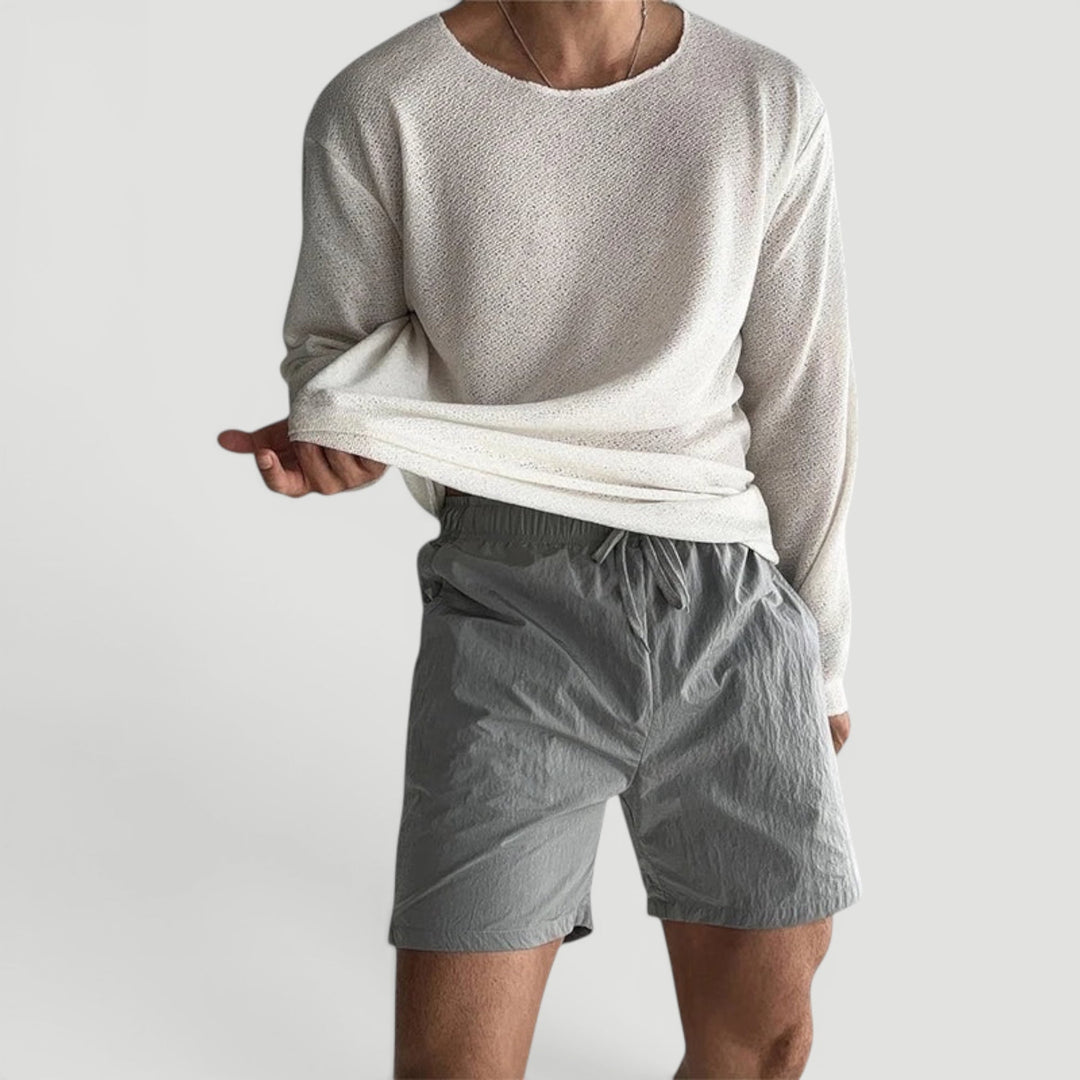 Versatile grey men's relaxed fit shirt, comfortable & easy care, ideal for all-season casual wear.