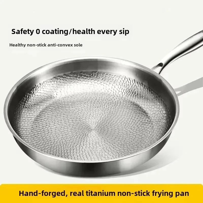 Durable hammered titanium skillet with long handle. Perfect metal pan for induction cooking.