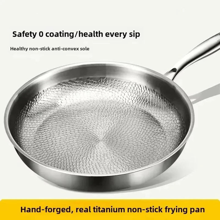 Durable hammered titanium skillet with long handle. Perfect metal pan for induction cooking.