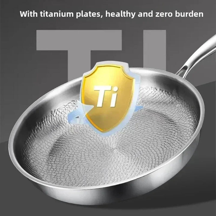 Stylish hammered titanium frying pan, ideal for induction hobs. Versatile kitchen cookware.