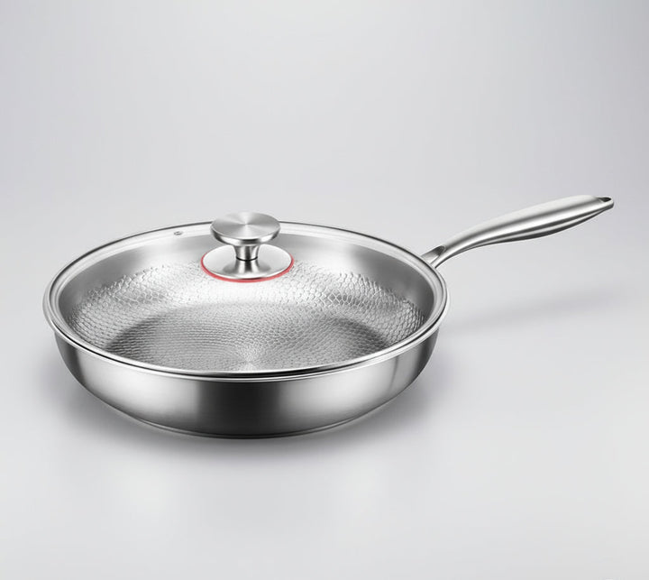 Versatile hammered titanium skillet for induction cookers. A premium, durable metal pan.