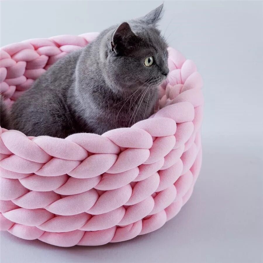 Cozy woven cat bed, a comfortable handmade retreat for your beloved pet.