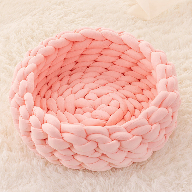 Your cat will love this plush, hand-woven basket for cozy naps.
