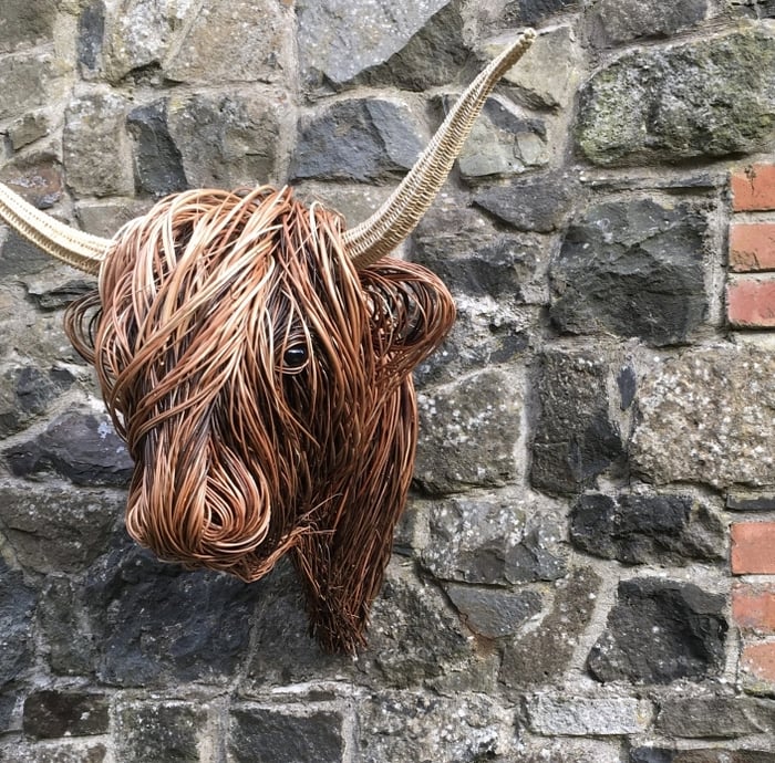 Unique Toro rustic wall sculpture. Handmade rattan art decor, perfect organic design accent for any room.