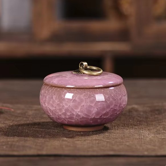 Decorative ceramic pet urn for ashes, craquelé glaze, a timeless piece of home decor tribute.