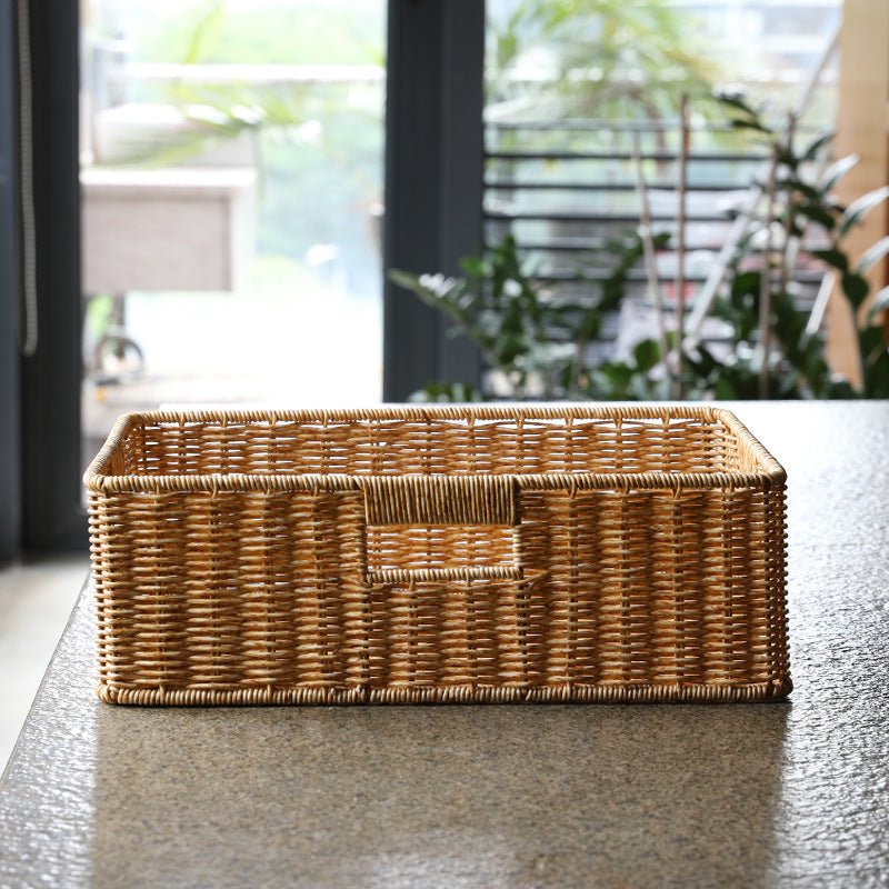 Decorative rectangular wicker basket, ideal for decluttering any room.