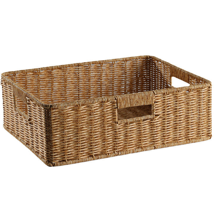 Woven natural wicker storage basket with sturdy handles for home use.