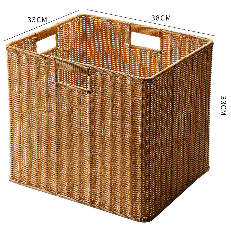 Handwoven rectangular wicker bin for blankets or toys storage.