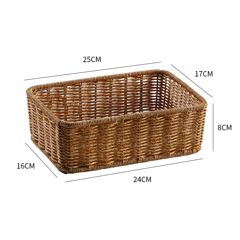 Rectangular wicker storage basket, natural, for nursery items.