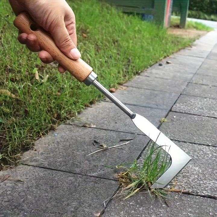 Handheld stainless steel weed remover with wooden handle for paths, patios & cracks. Durable garden tool.
