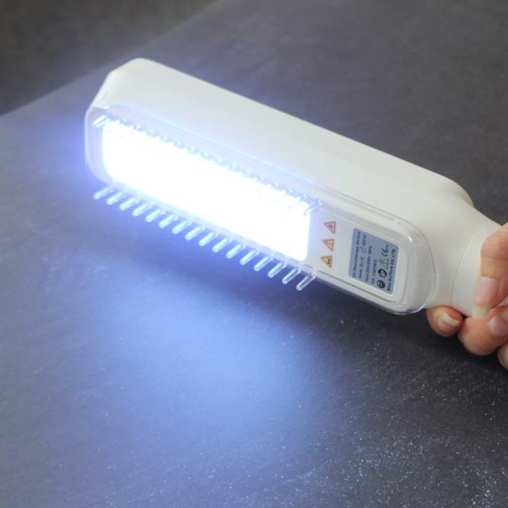 Compact handheld UVB lamp for convenient home phototherapy. Targets psoriasis, vitiligo, & eczema for skin relief.