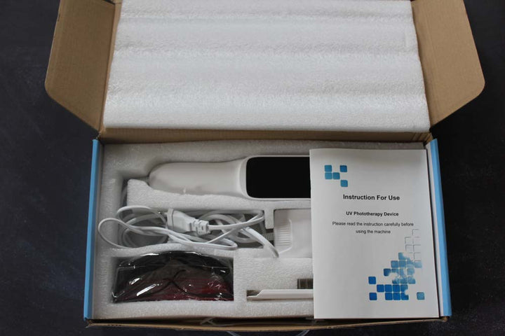 Ergonomic handheld UVB phototherapy device for effective treatment of psoriasis, vitiligo, and other skin conditions.