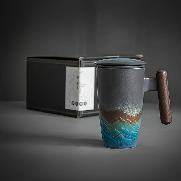 Durable handmade ceramic tea mug, authentic design, with a tea strainer and a distinct wood handle.