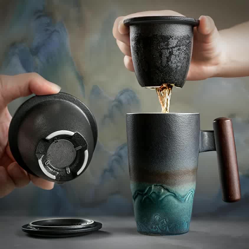 Enjoy loose leaf tea with this authentic handmade ceramic tea mug, infuser, and comfortable wooden handle.