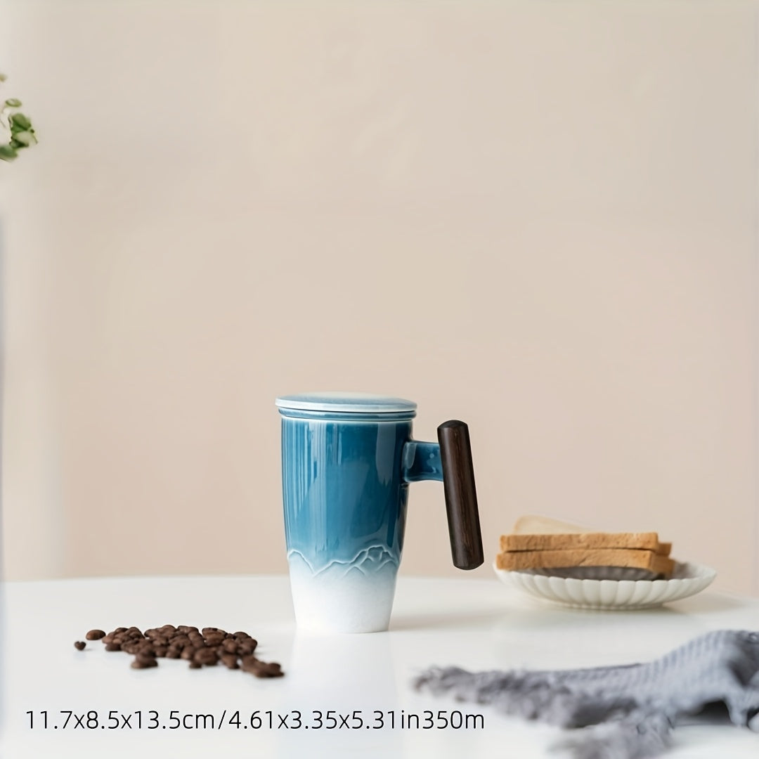 Artisan ceramic tea mug with a practical infuser, unique texture, and an ergonomic wooden handle.