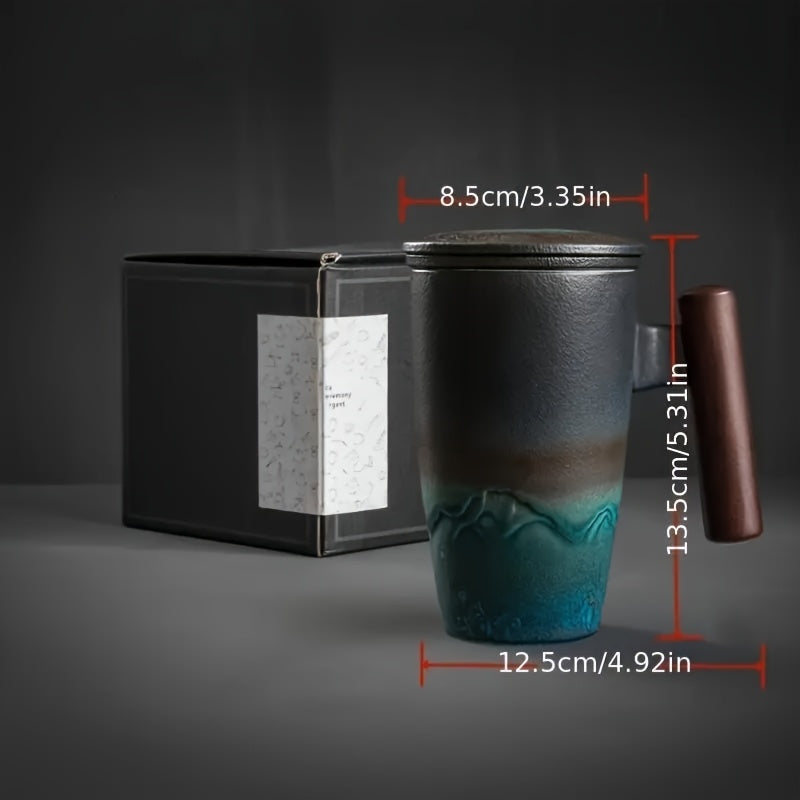 Beautiful handmade ceramic tea mug with infuser and wood handle, an ideal gift idea for all tea lovers.