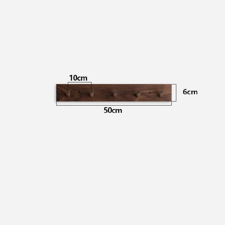 Simple wooden coat rack, wall-mounted design with Zen and minimalist appeal.