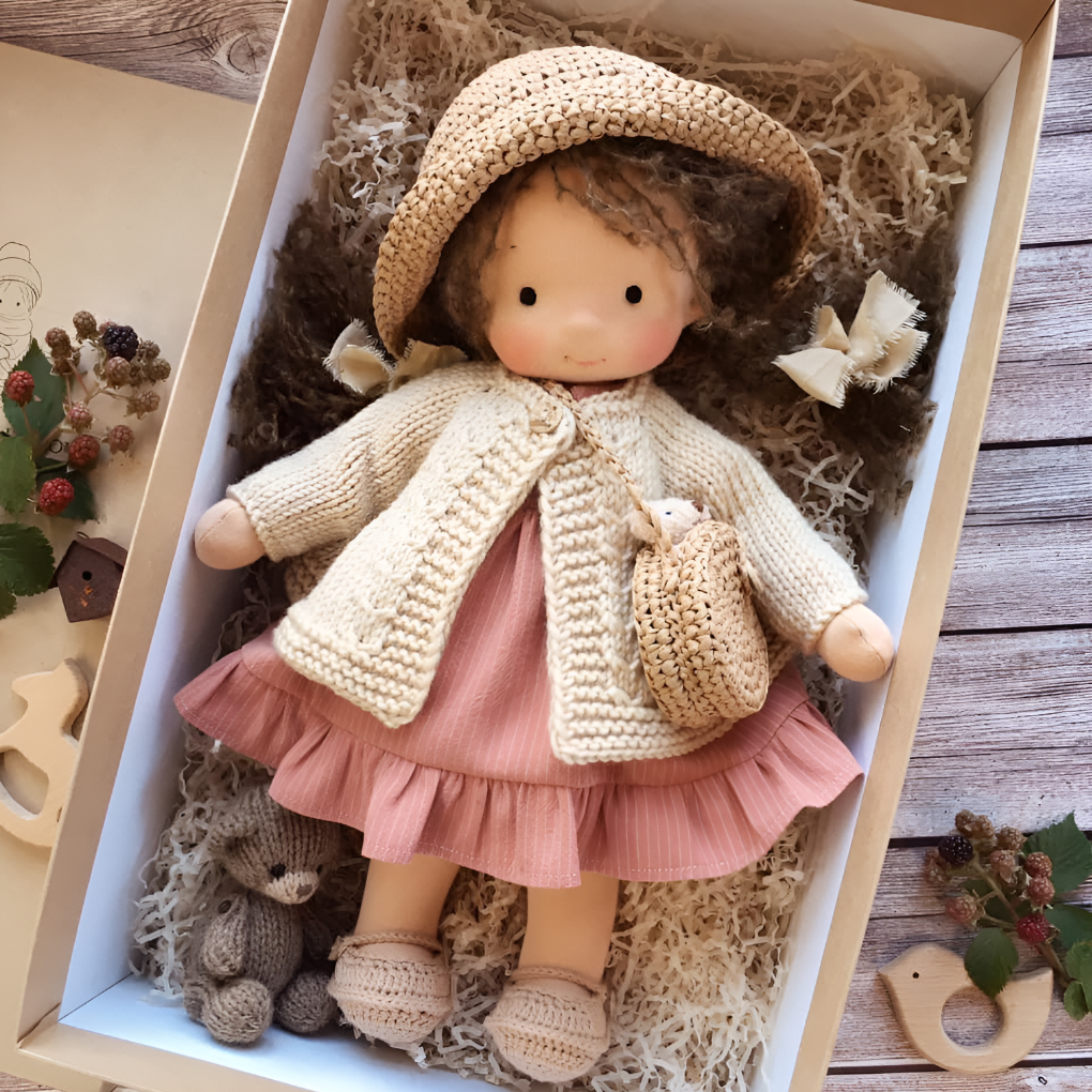 A smiling Waldorf cuddly doll, designed to bring joy to children.