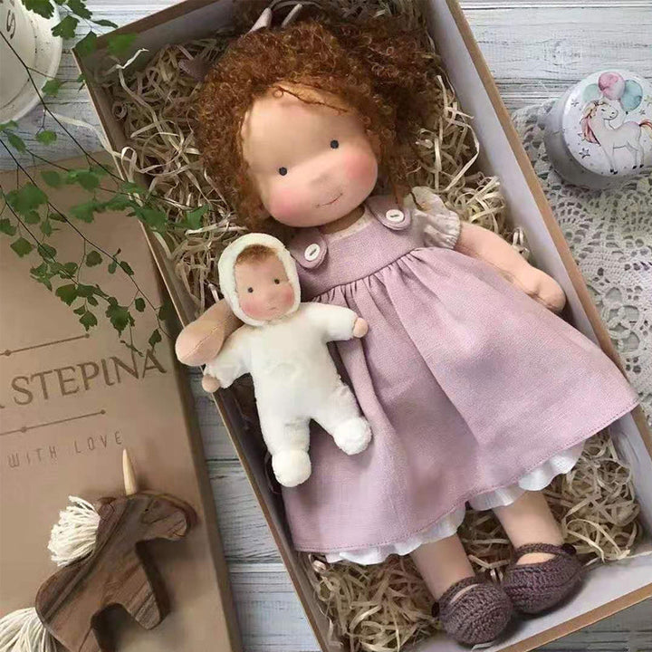 Full body shot of a classic handmade Waldorf doll, ready for imaginative play and comfort.
