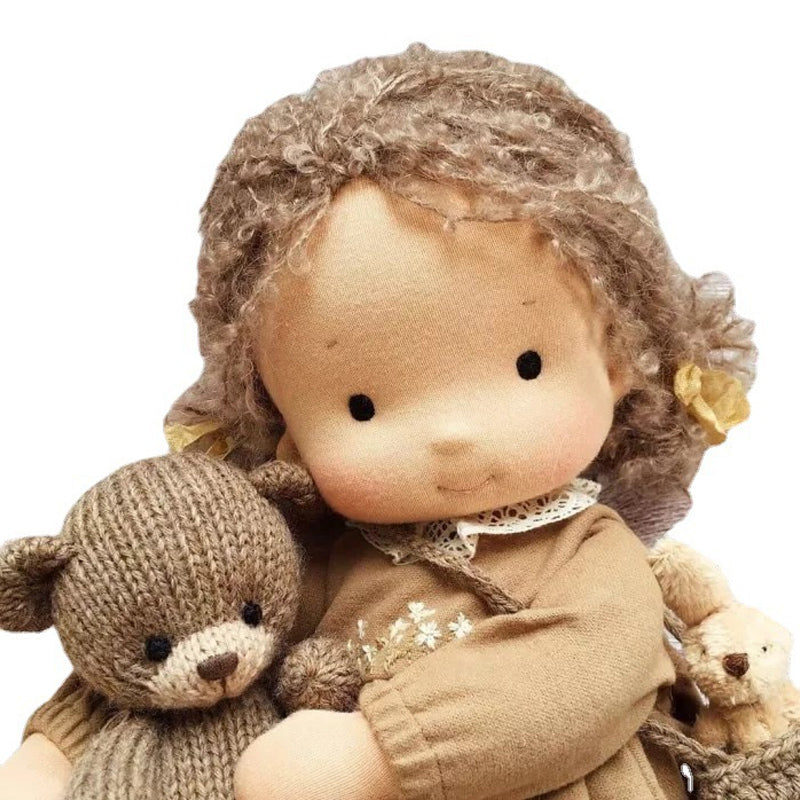 Beautiful handmade Waldorf doll, an educational toy for children's imaginative and open-ended play.