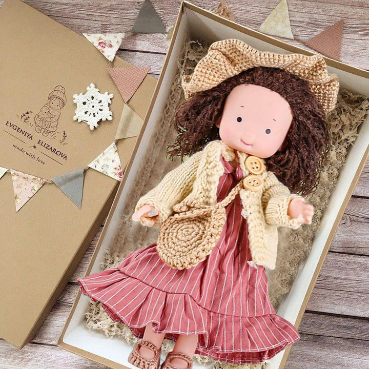 Child holding a soft handmade Waldorf doll, fostering imaginative play and emotional connection.