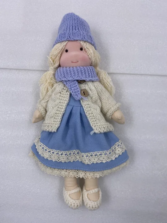 Close-up of a Dear Lana Waldorf doll, showcasing its durable and washable fabric.