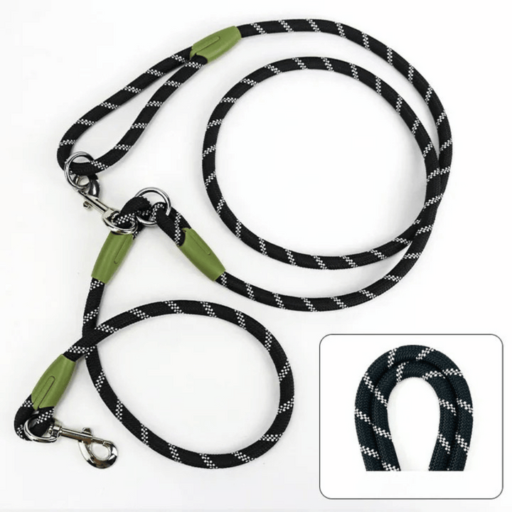 Large dog enjoying a walk with owner using a reflective hands-free running leash.