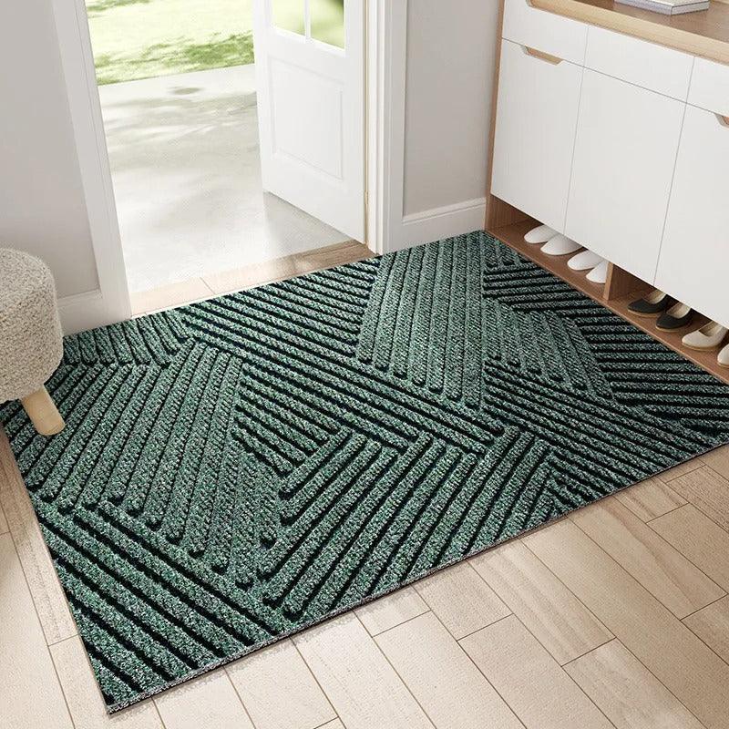 Heavy-duty non-slip door mat for indoor and outdoor use, effectively traps dirt & protects floors.