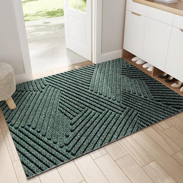 Heavy-duty non-slip door mat for indoor and outdoor use, effectively traps dirt & protects floors.