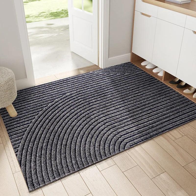 Durable dirt trapping door mat, heavy-duty & non-slip for safe indoor & outdoor entranceways.
