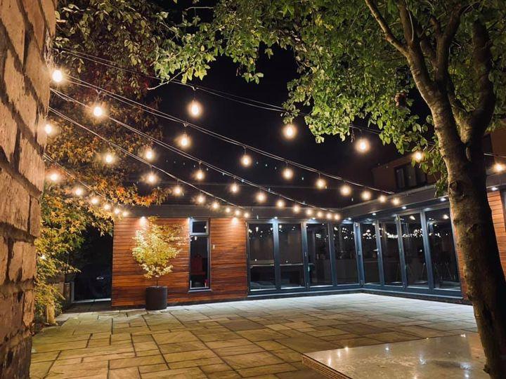 Close-up of durable outdoor LED string lights, showcasing waterproof design.