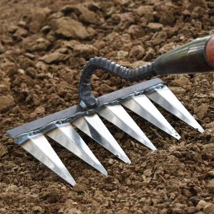 Durable, rust-resistant steel garden rake, ideal for tough weeding & gardening tasks.