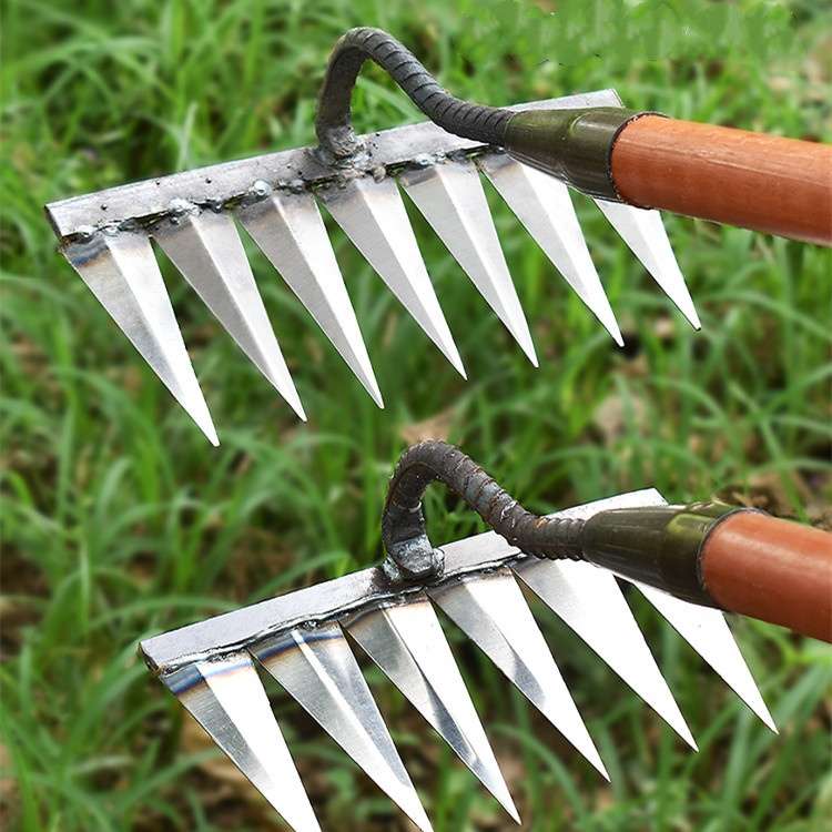 Reliable heavy-duty steel garden rake, a durable outdoor tool for intense weeding & soil preparation.