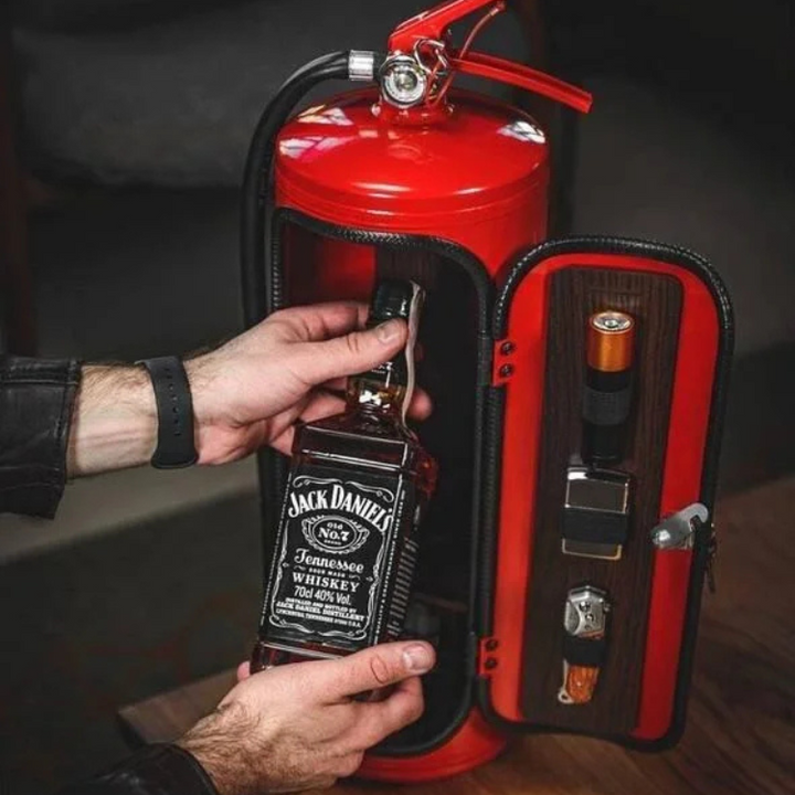 Open HiddenFlame mini bar, revealing liquor bottles & glasses inside its unique fire extinguisher design.