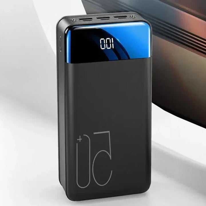 Compact portable power bank, universal charger for phones & laptops. High capacity & fast charging solution.