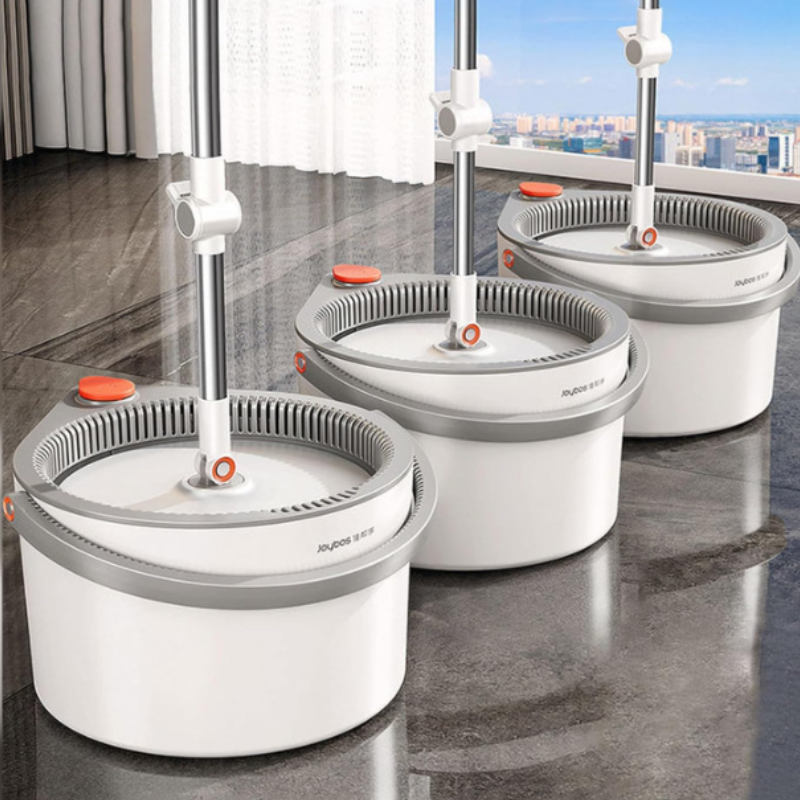 Household Self-Cleaning SpinMop system with reusable microfiber mop head for easy floor cleaning.