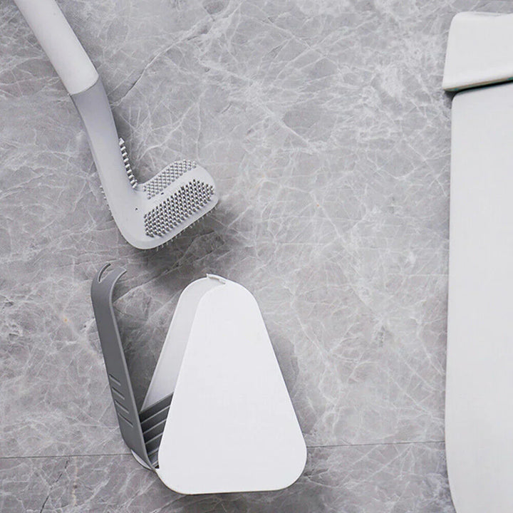 Modern self-cleaning toilet brush and sleek holder. An innovative tool for superior bathroom hygiene.