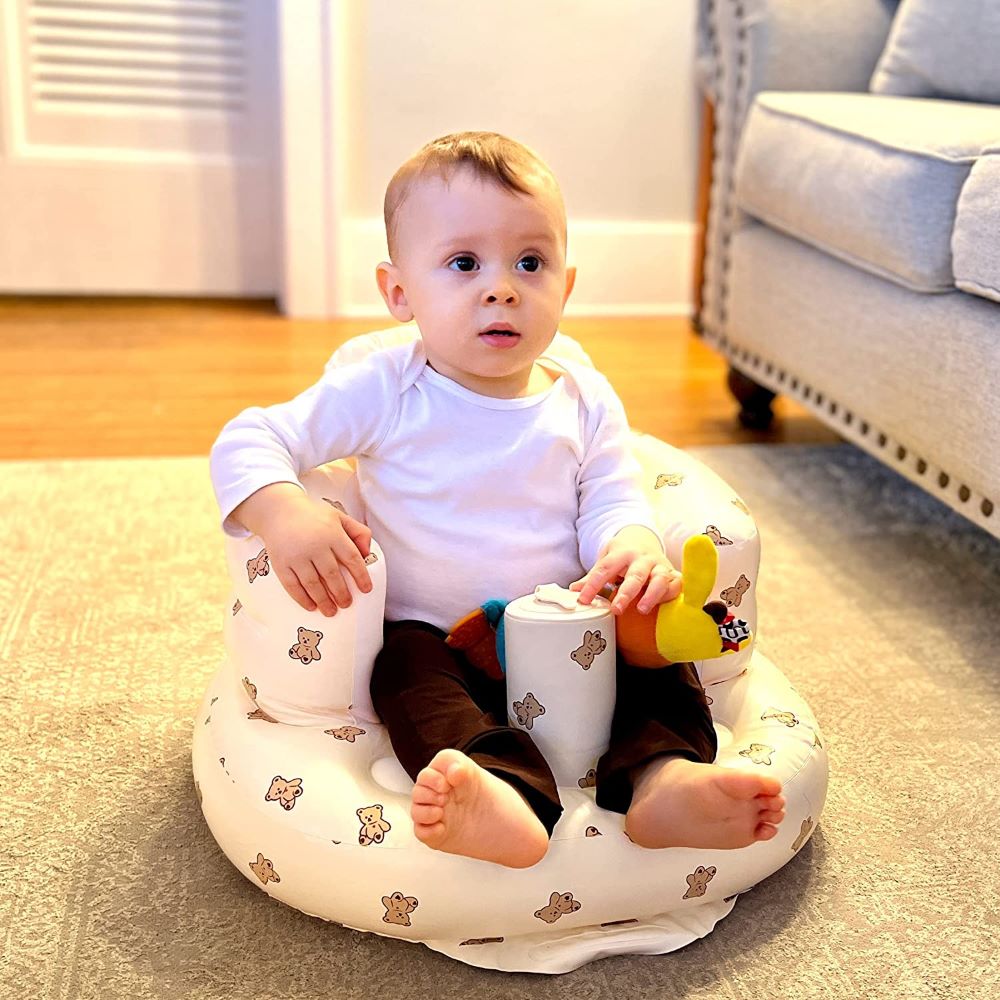 Portable baby bath seat providing comfort and safety during bath time for infants.