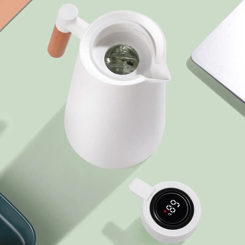 Stylish thermal jug featuring a clear temperature display and ergonomic wood handle, perfect for coffee or tea.