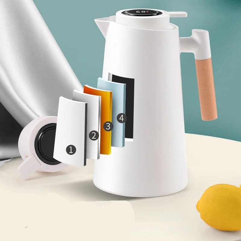 Modern insulated carafe with integrated temperature gauge and a warm wood handle, ideal for kitchen or office.